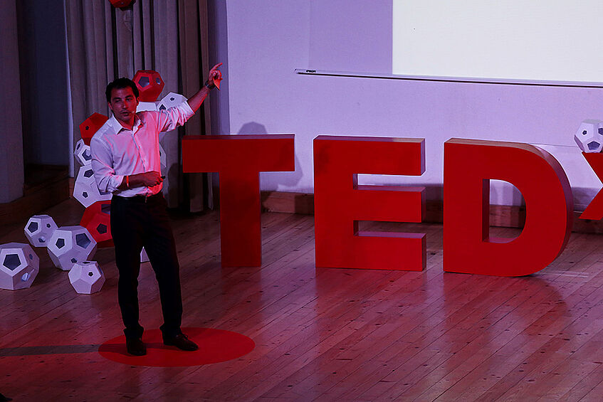 Temelko Dechev delivering a TED talk with the topic 