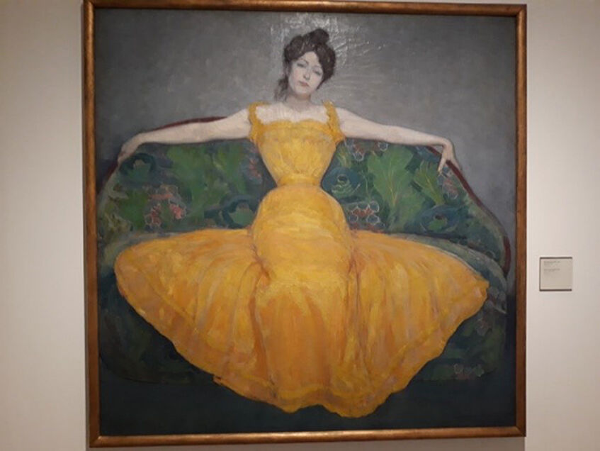 The painting “Woman in a Yellow Dress” by Max Kurzweil