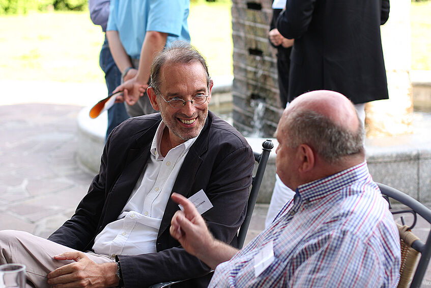 Bundesminister Heinz Fassmann im Gespräch mit Universitätsprofessor Walter Schrammel