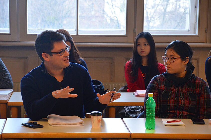 Two student taking part in classroom discussion