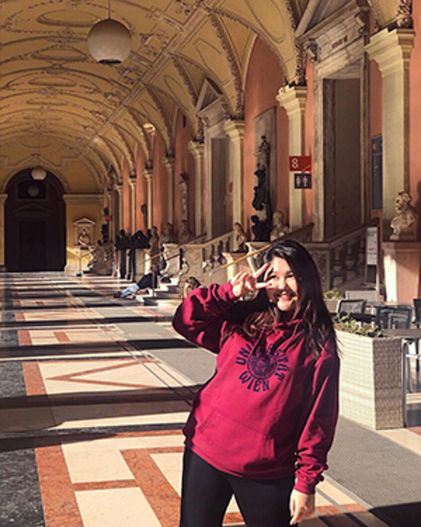 Student in the Arkadengang at the University of Vienna