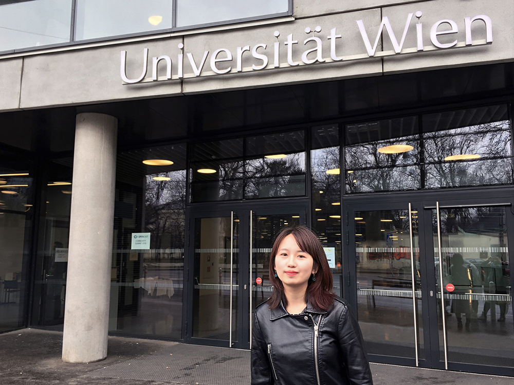 Girl in front of a building